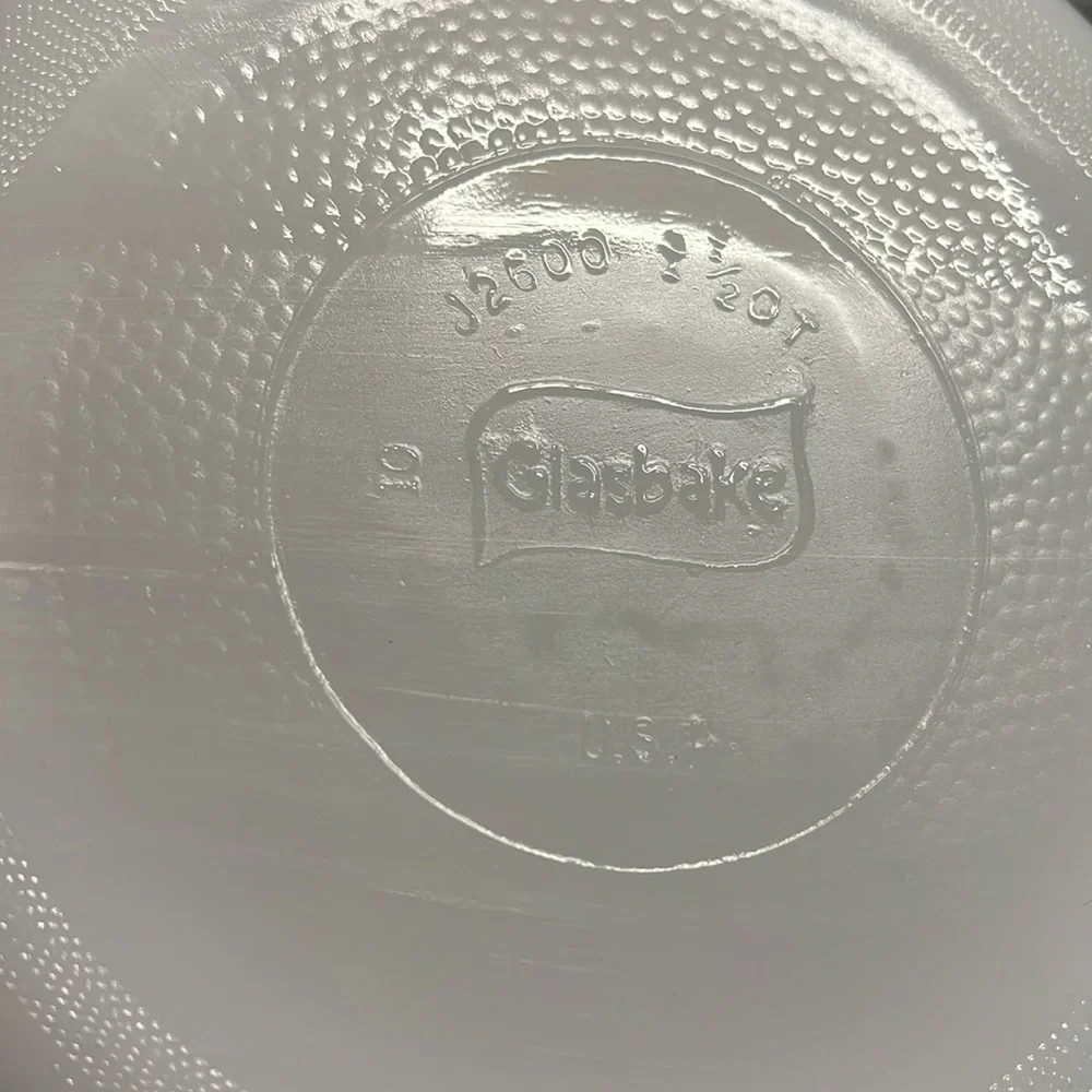 Glassbake 8 inch round. “crazy daisy pattern”.  Milkglass. Like new
